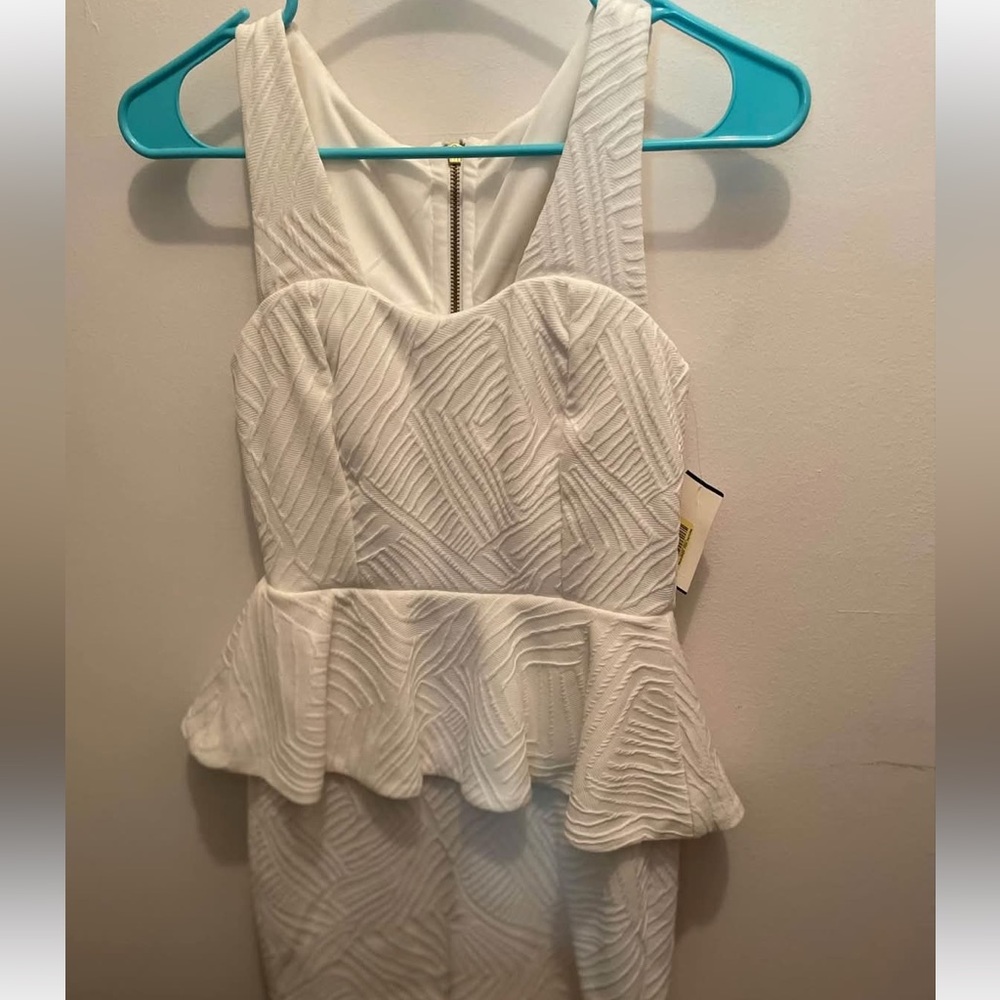 White Textured Peplum Dress